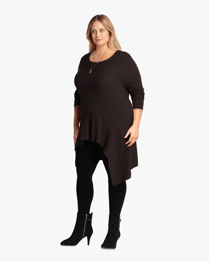 Plus size model with hourglass body shape wearing Trixie Ribbed High-Low Sweater by Ryan Wythe | Dia&Co | dia_product_style_image_id:115326